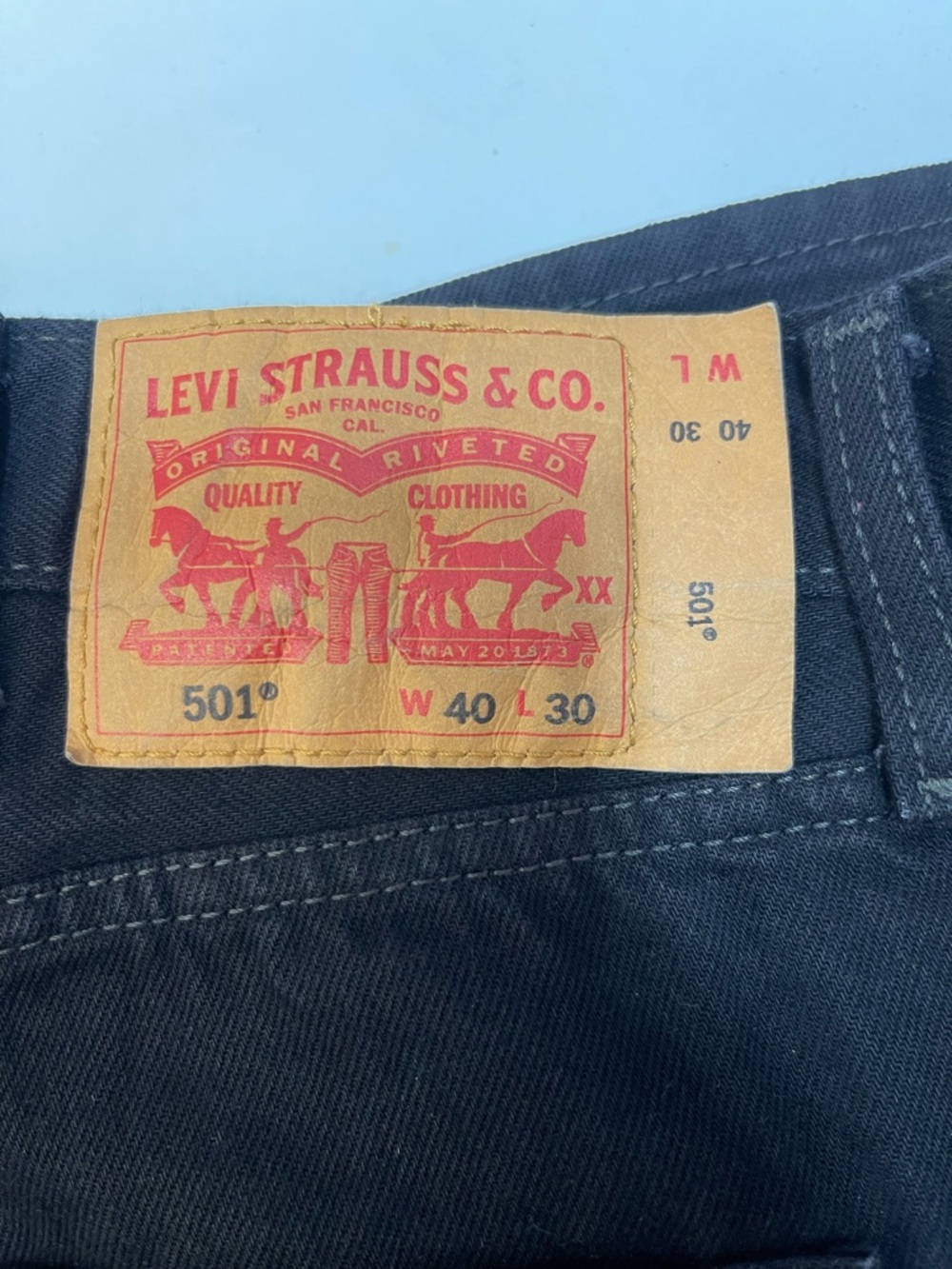 Levi's 501® Men's Black Straight Jeans with Tan Leather Patch